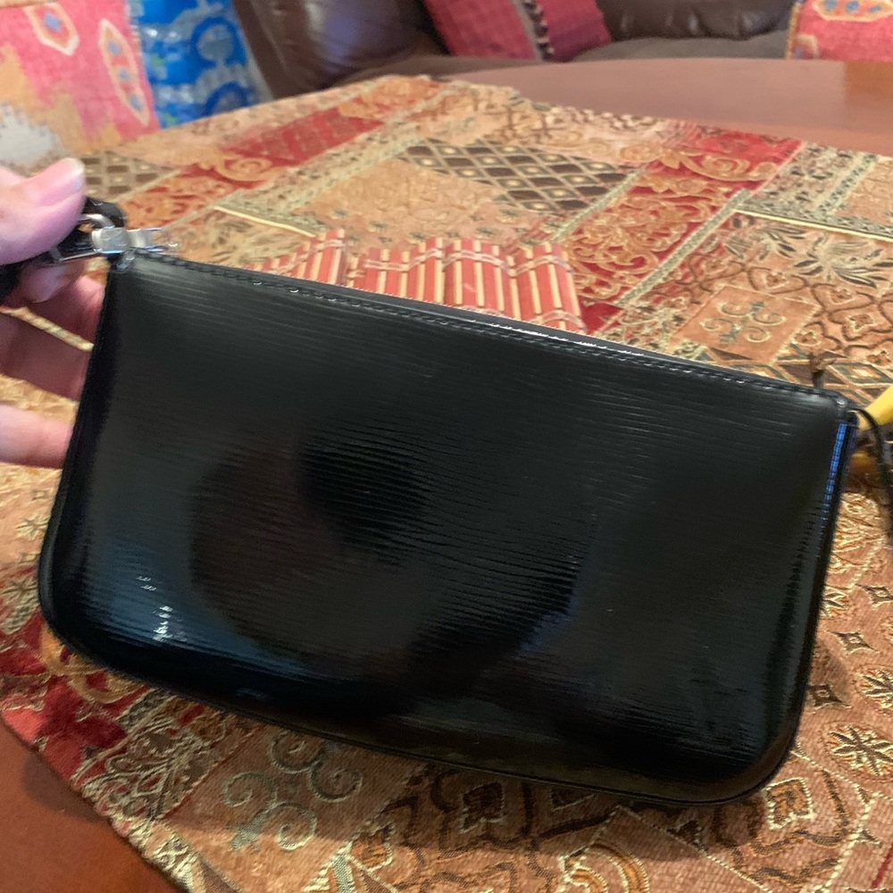 Authentic Louis Vuitton epi electric pochette nm